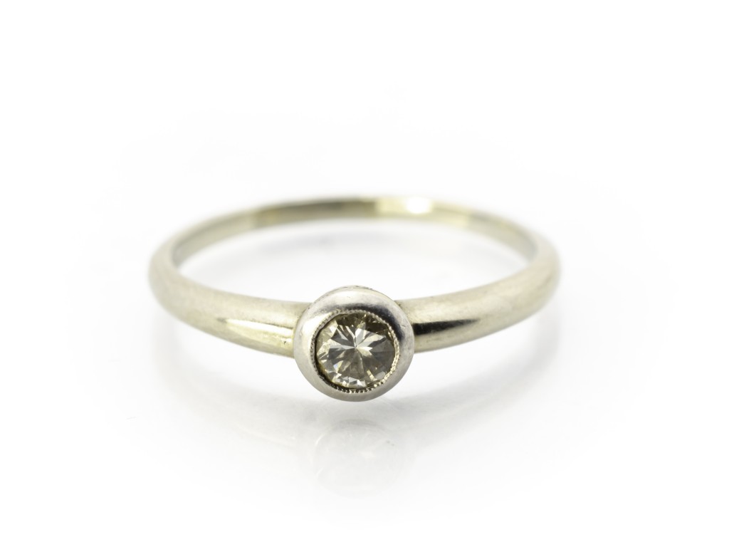 Zlatý prsten s diamantem 0,25 ct, vel. 59
