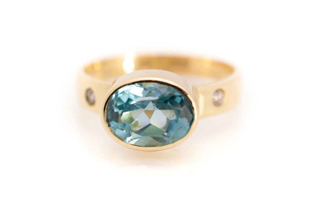 Zlatý prsten s modrým kamenem, vel. 60