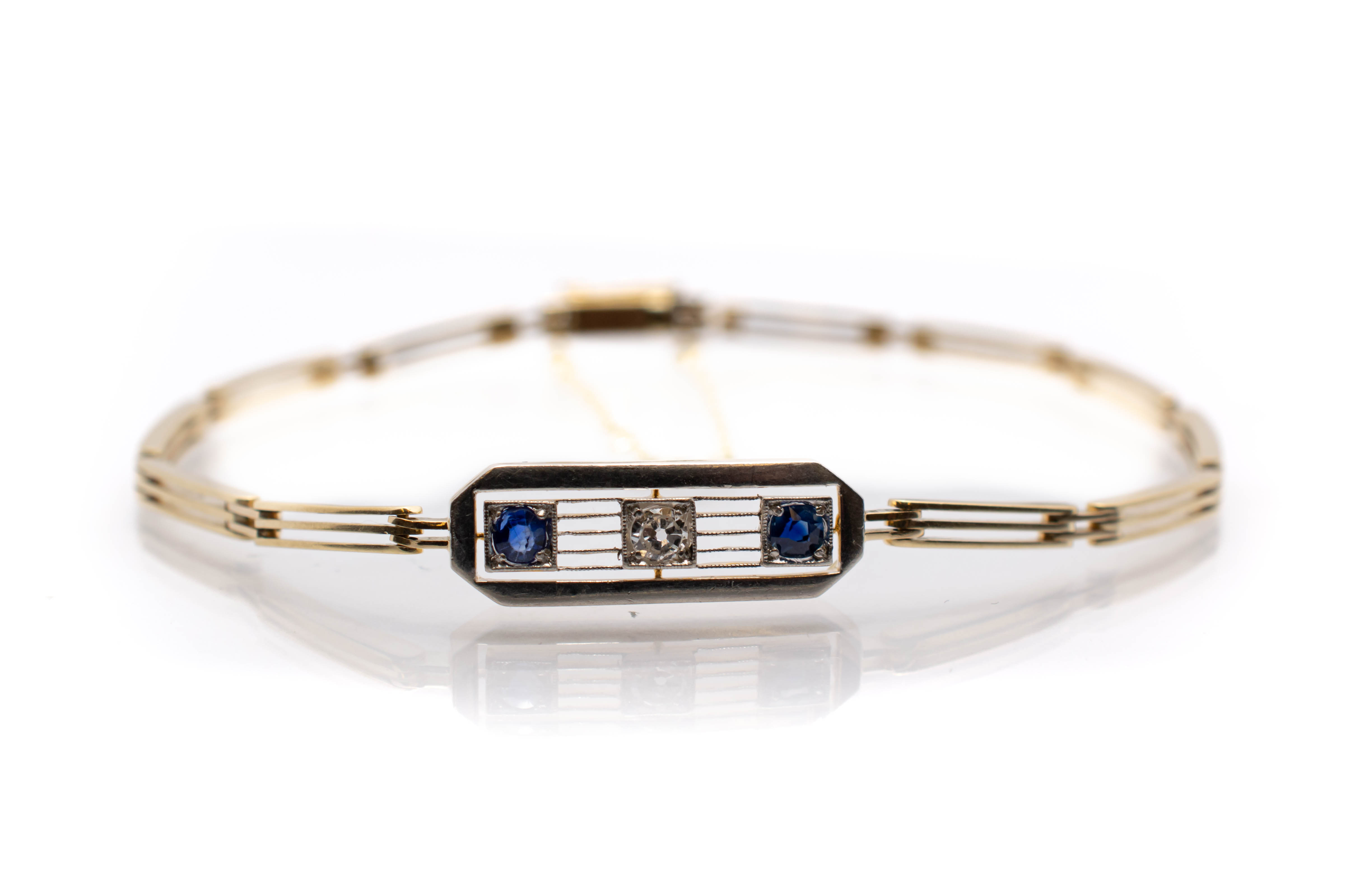 Starožitný zlatý náramek s diamantem a modrými kameny - safír