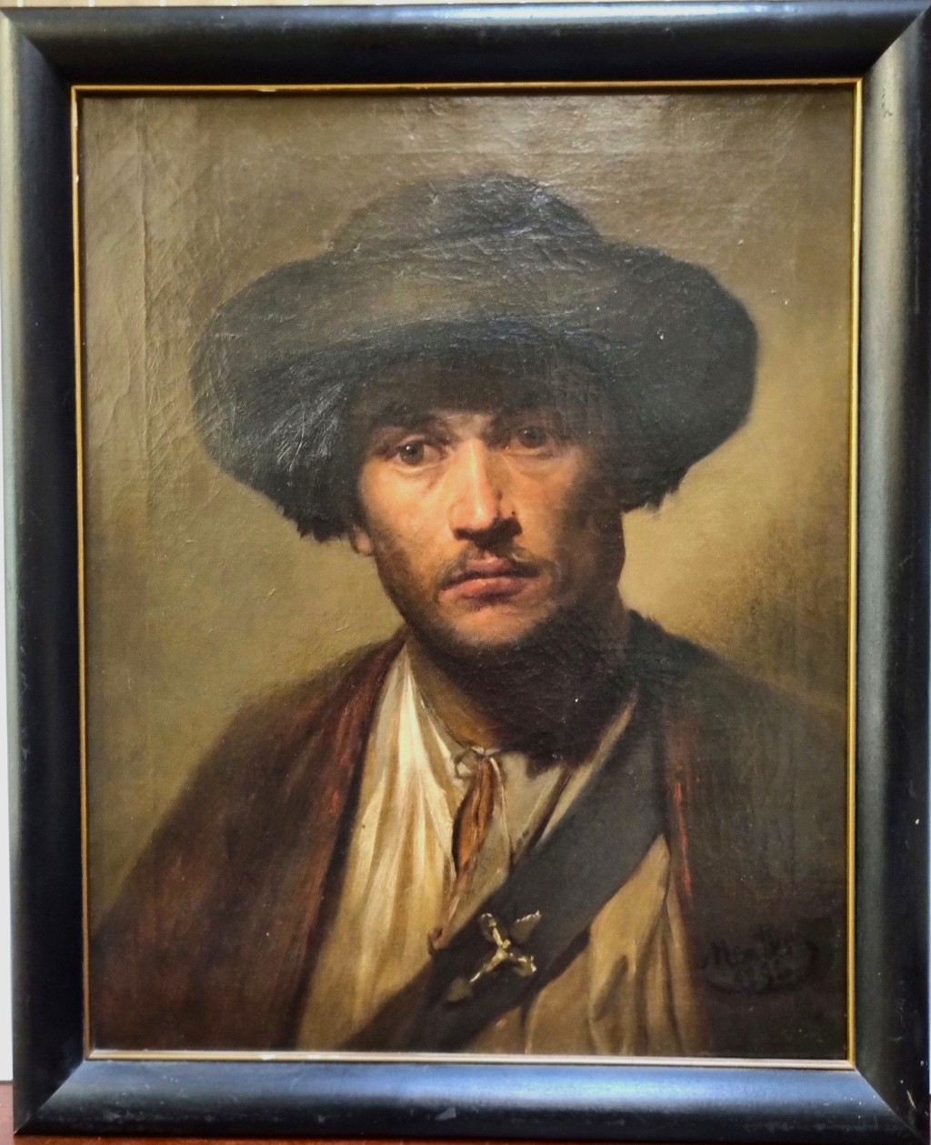 Portrét muže v klobouku
