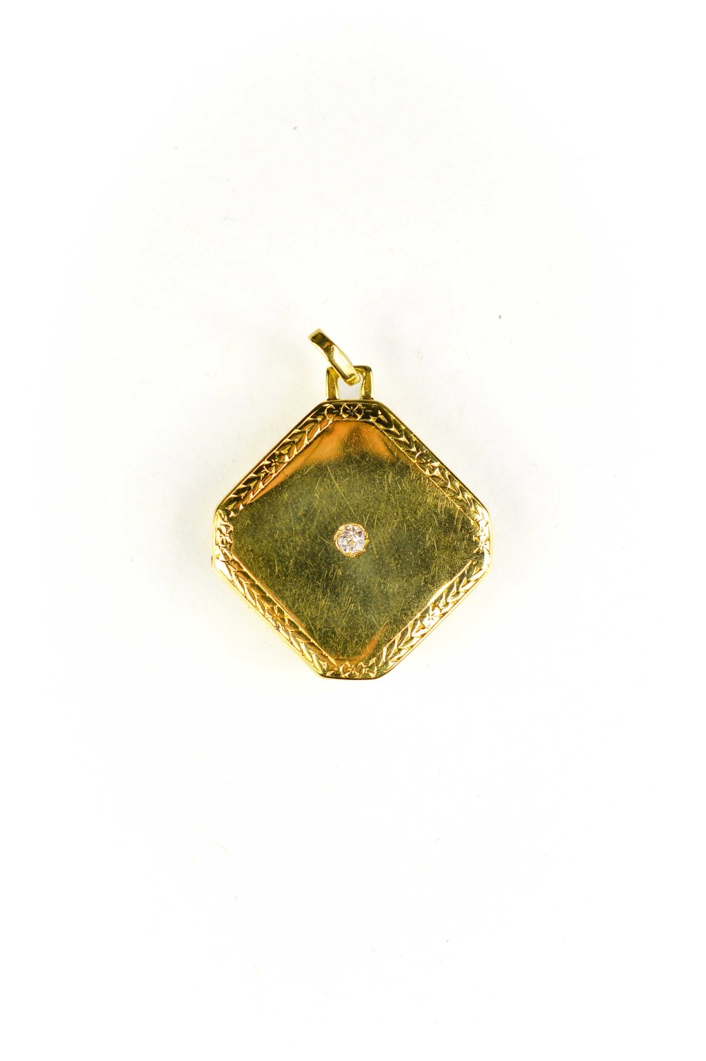 Starožitný zlatý medailonek s diamantem
