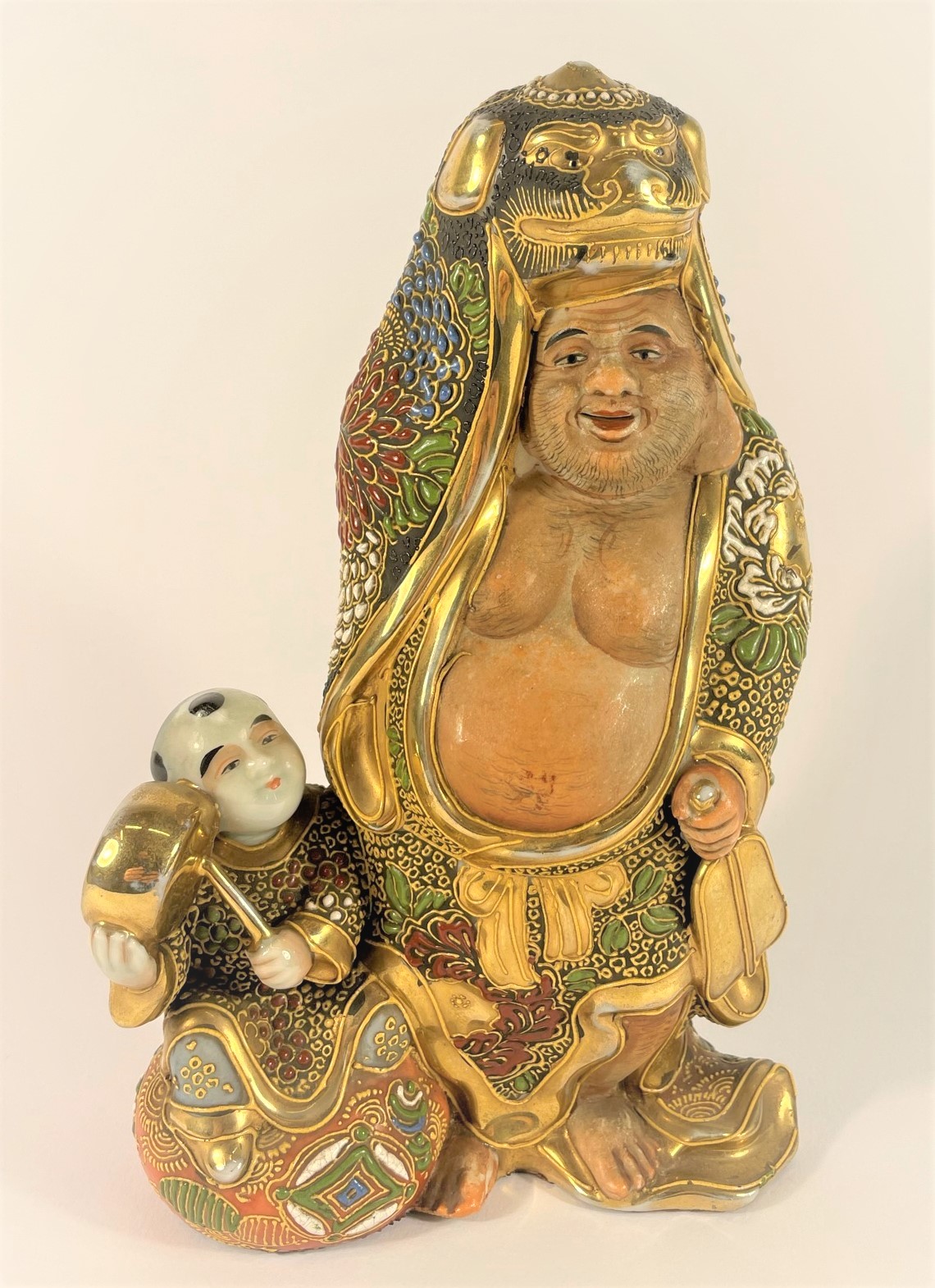 Buddha s malým muzikantem