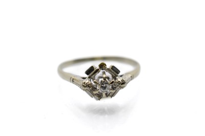 Prsten z bílého zlata s diamanty, vel. 56