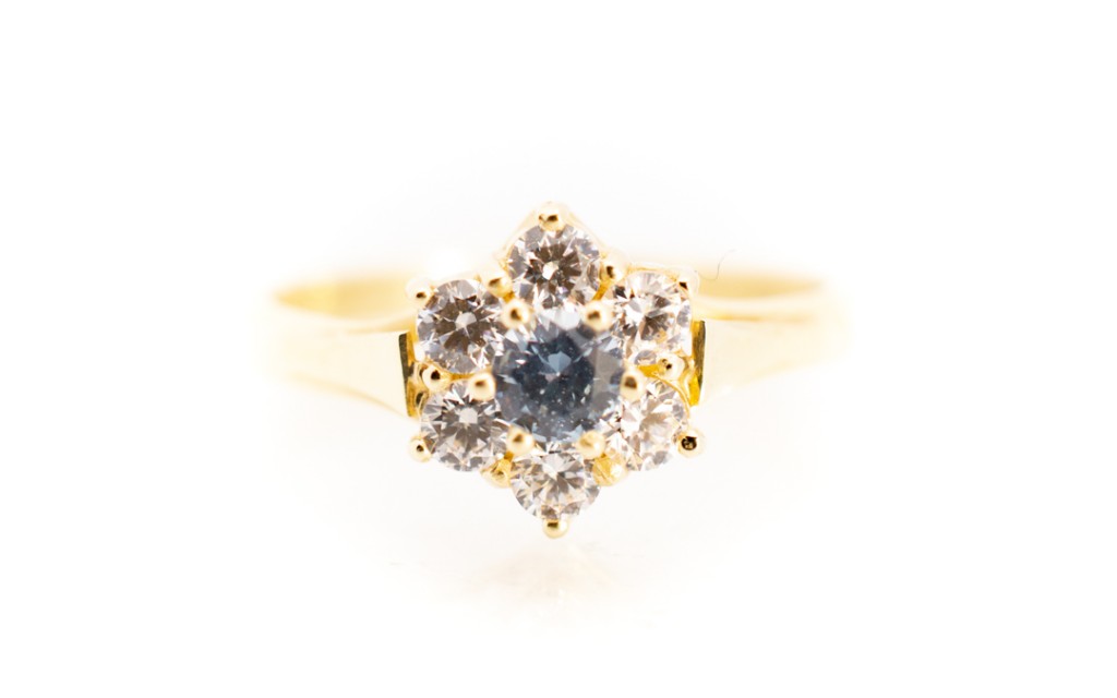 Zlatý prsten se zirkony a modrým kamenem, vel. 51